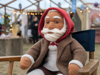 How can i price and package limited-edition knitted folk characters for a weekend festival pop-up?